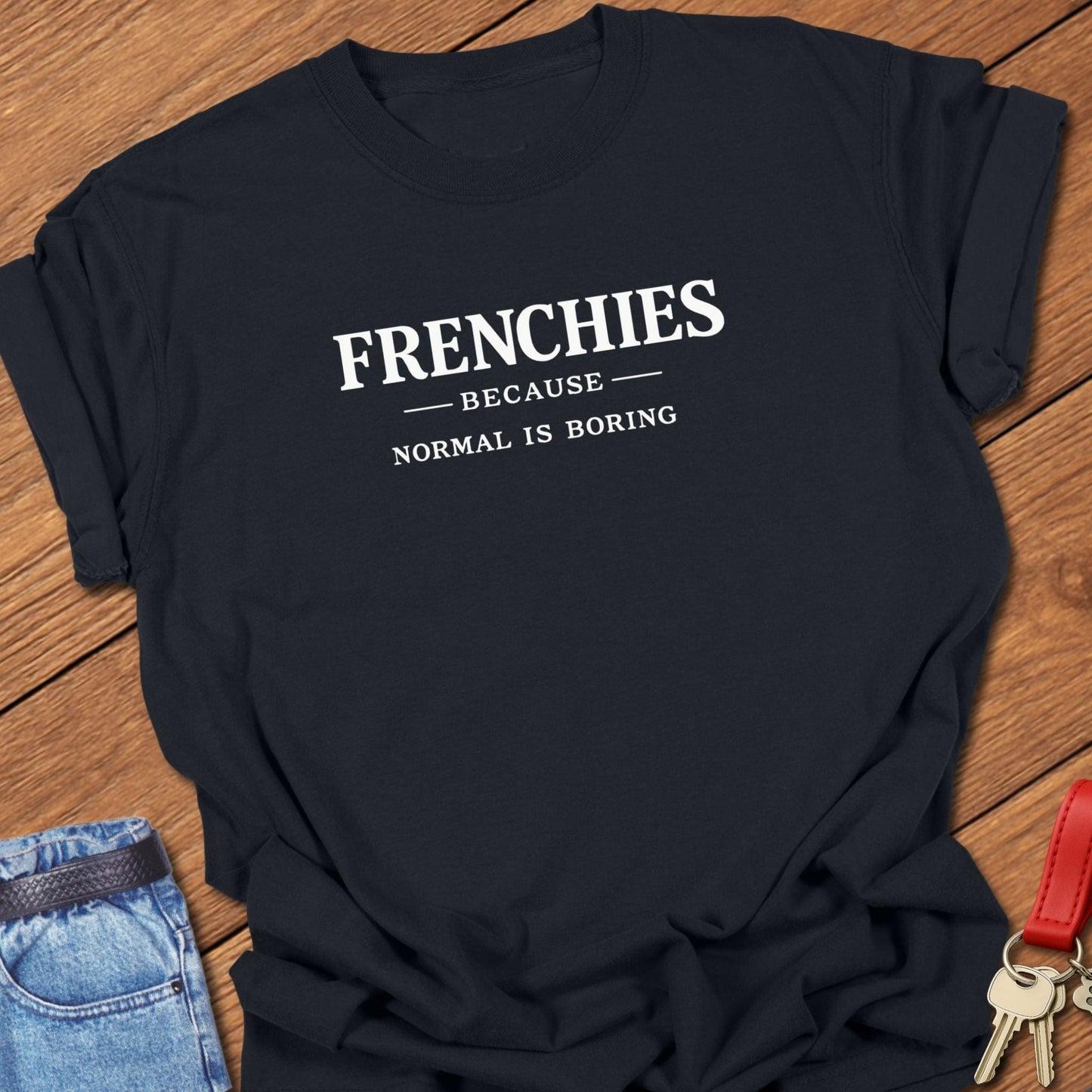 French bulldog frenchies because normal is boring text graphic printed on black Comfort Colors t shirt.