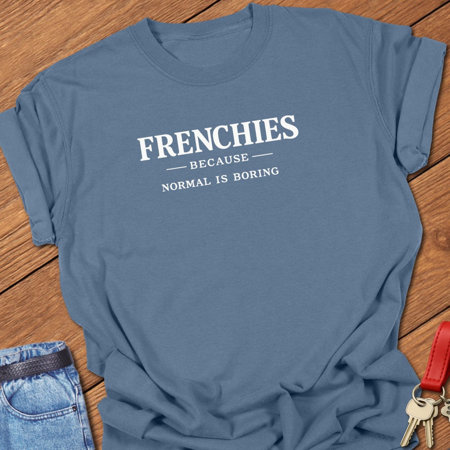 French bulldog frenchies because normal is boring text graphic printed on blue jean Comfort Colors t shirt.