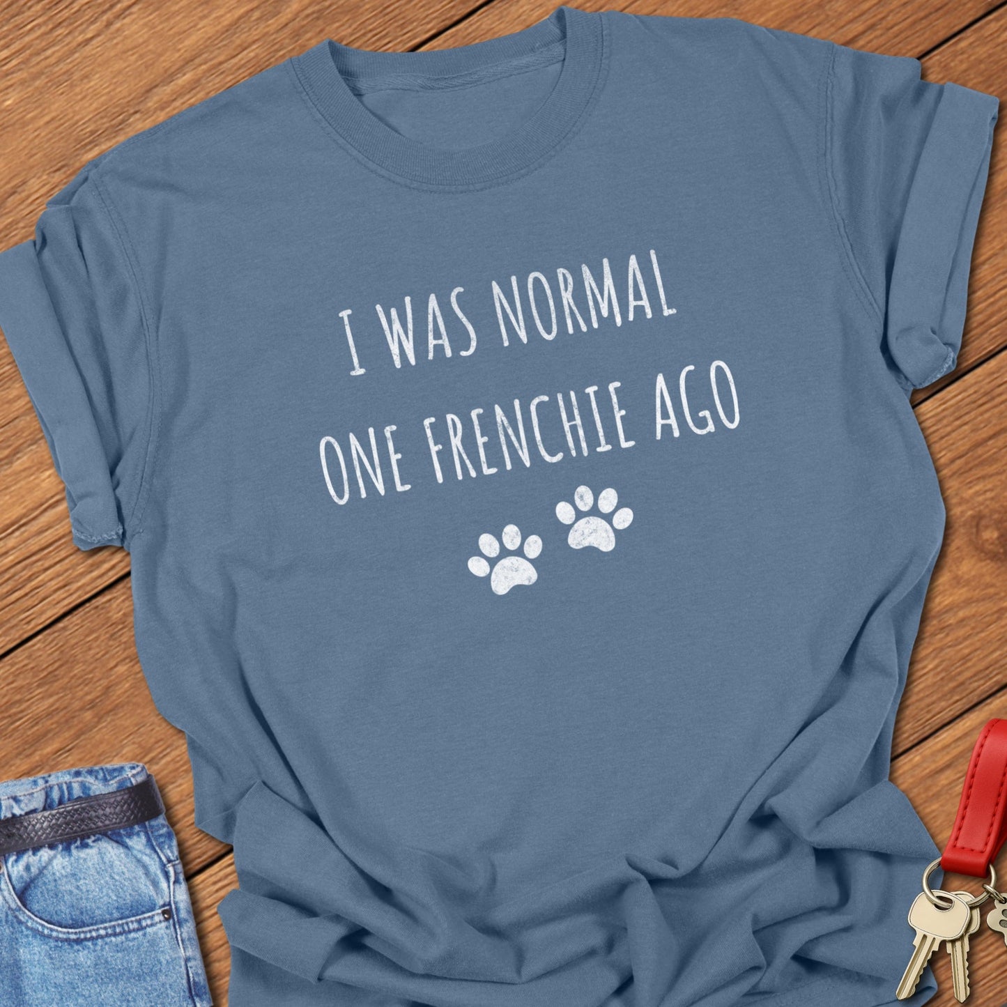 French bulldog witty saying with paw print illustration printed on blue jean Comfort Colors t shirt