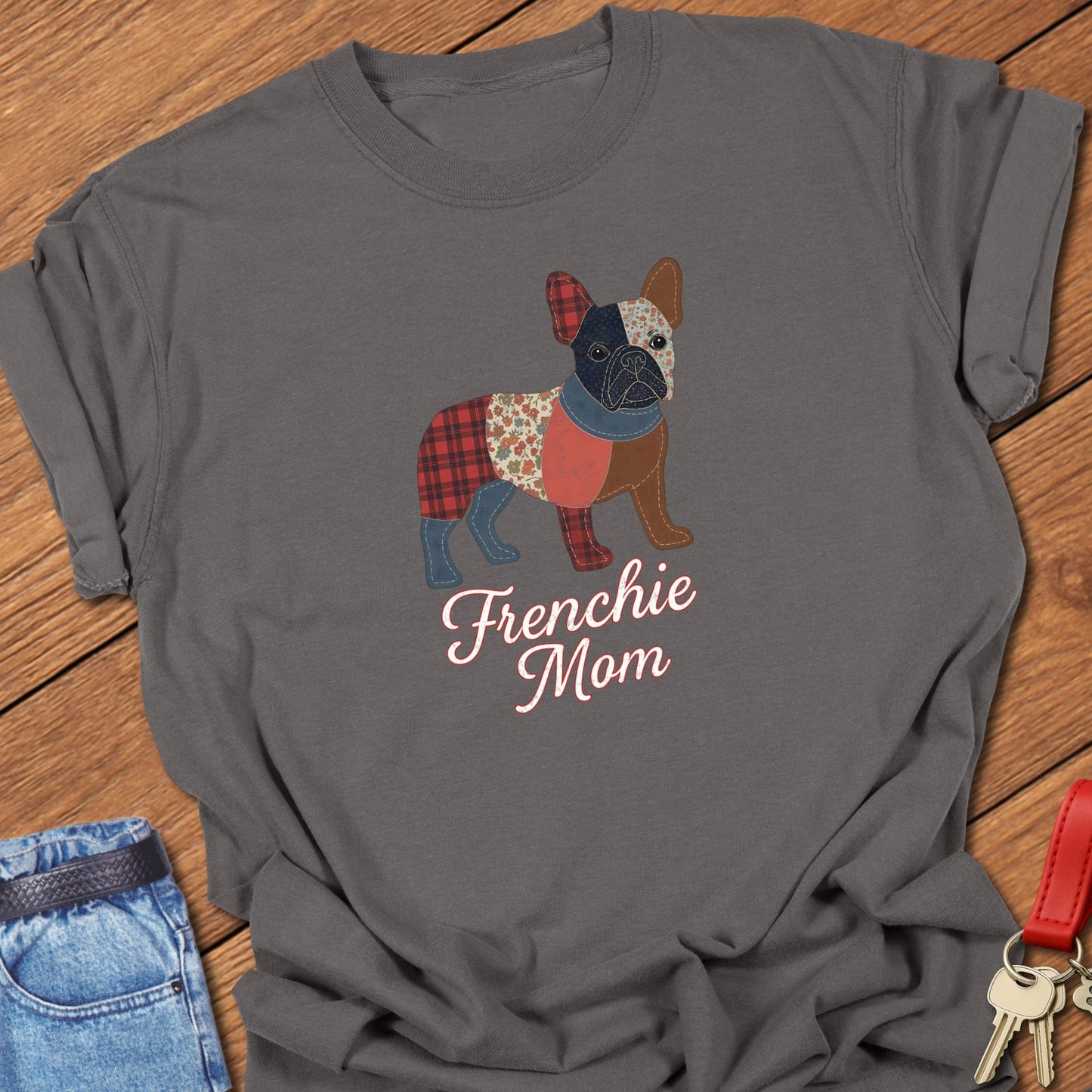 French bulldog patchwork-style illustration with mixed fabric textures and “Frenchie Mom” lettering printed on pepper Comfort Colors t shirt