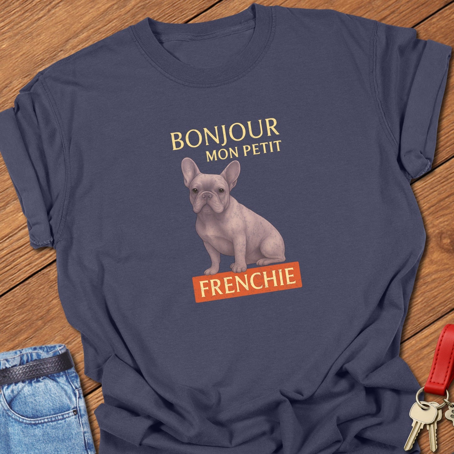 French bulldog vintage French typography illustration with pastel Frenchie graphic and Bonjour mon petit text printed on navy Comfort Colors t shirt