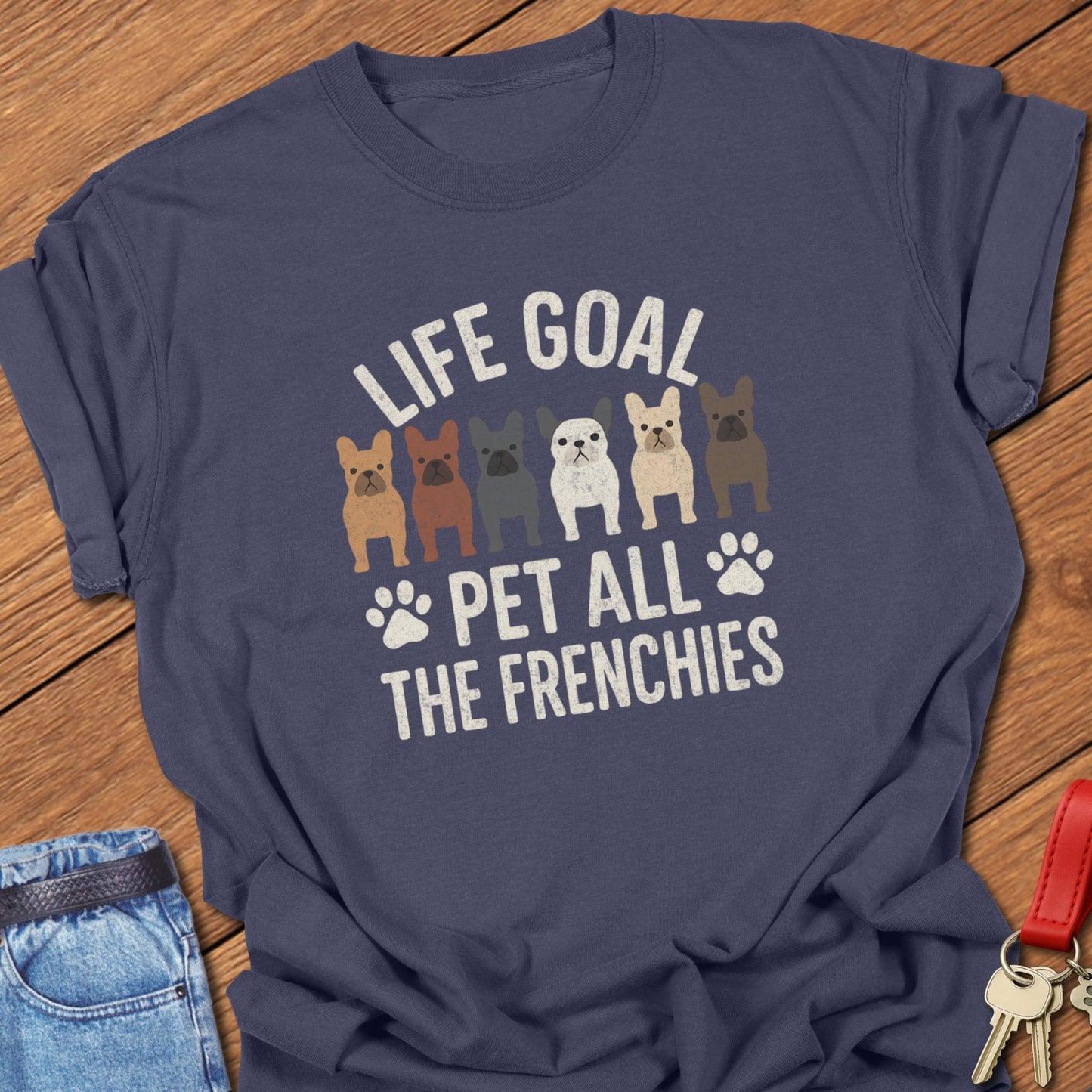 French bulldog pet lover illustration with multiple Frenchie graphics and life goal typography printed on navy Comfort Colors t shirt