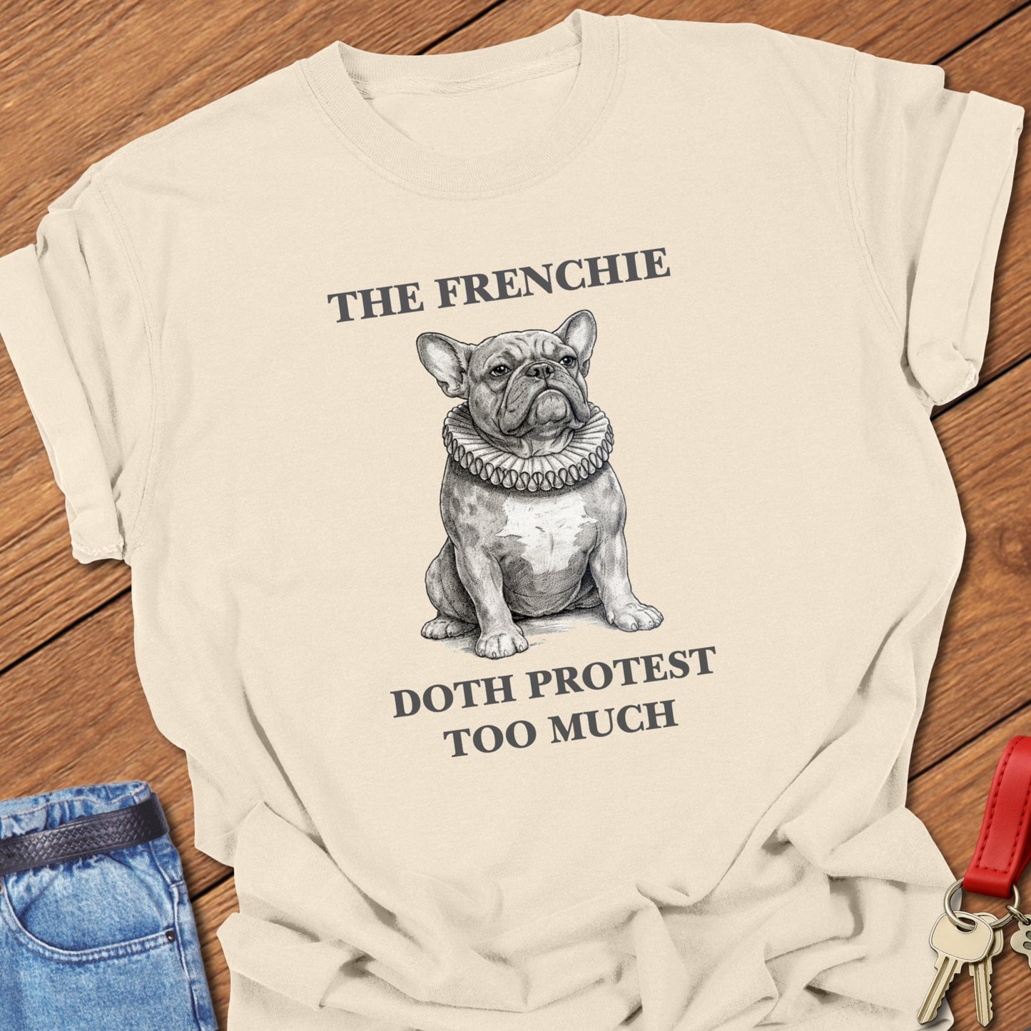 French bulldog vintage engraved illustration with ruffled collar and humorous text printed on ivory Comfort Colors t shirt.