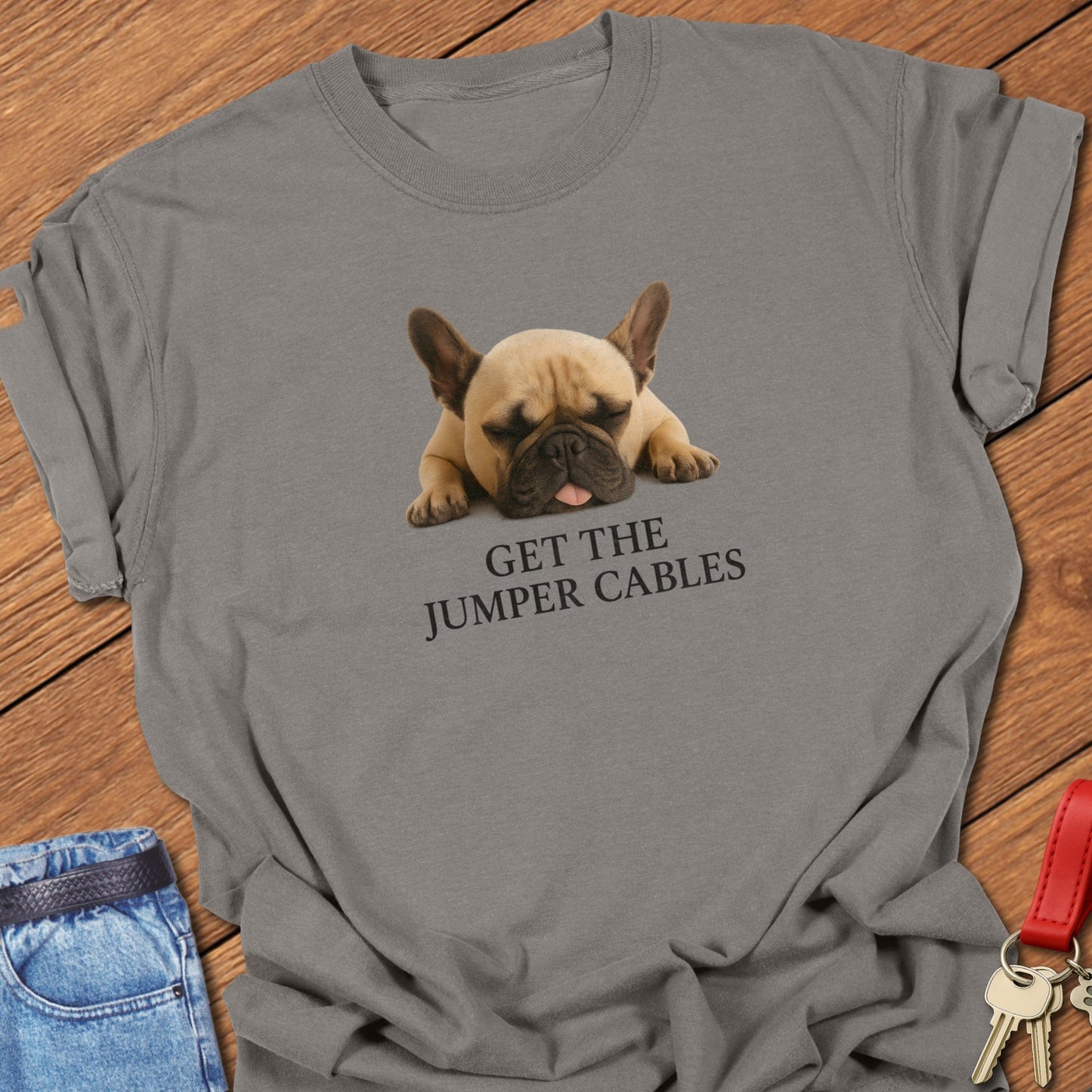 French bulldog sleeping with “Get the Jumper Cables” text design printed on blue jean Comfort Colors t shirt