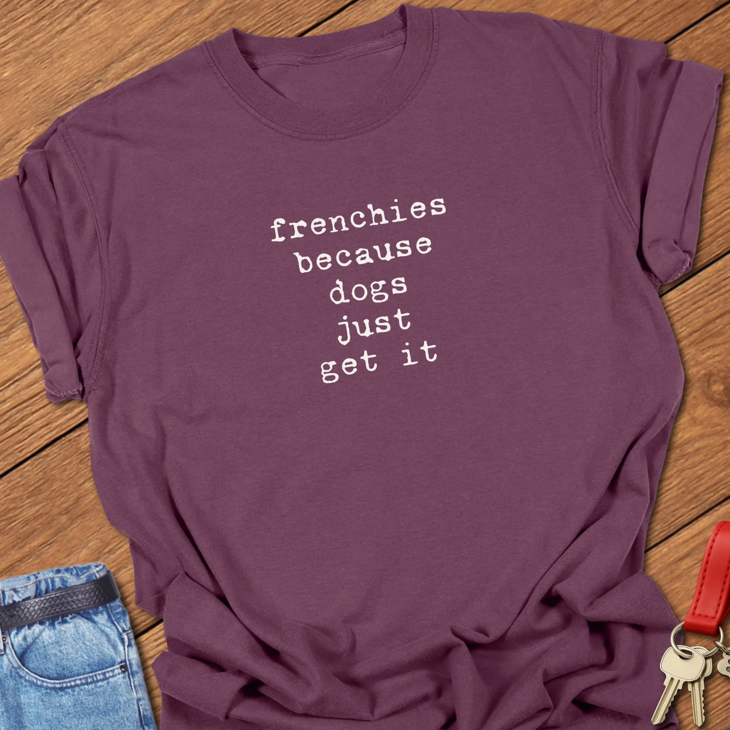 A Comfort Colors® cotton t-shirt in Berry featuring the phrase "Frenchies Because Dogs Get It" in elegant serif typography.