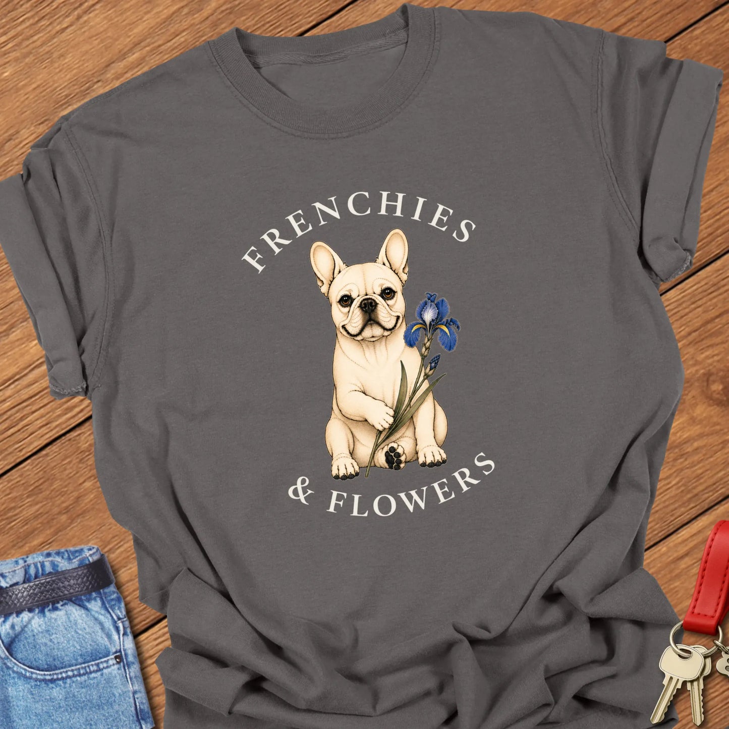 Frenchie Blue Iris botanical French Bulldog illustration with blue iris flower and Frenchies & Flowers typography printed on Comfort Colors® t-shirt in Pepper Color