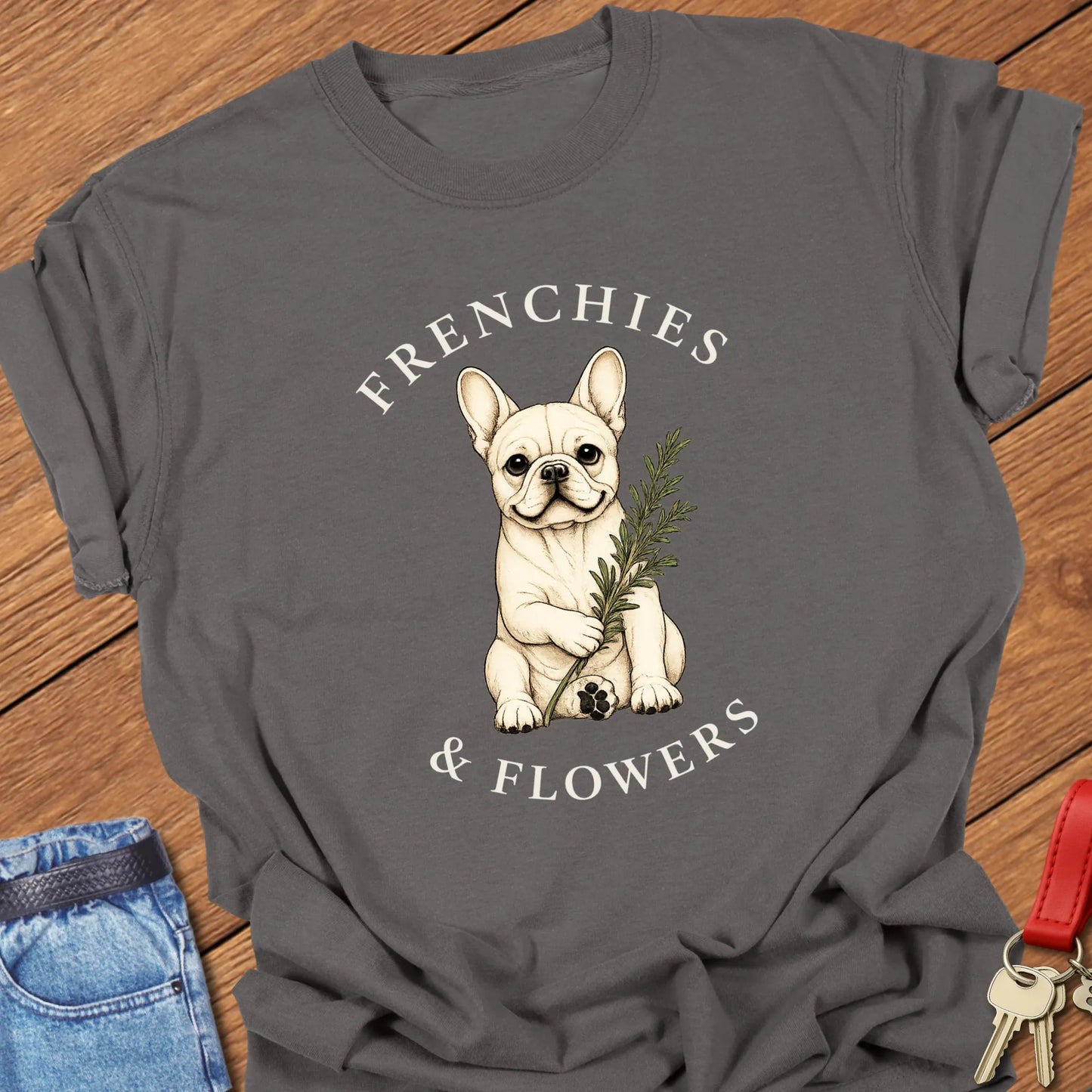Frenchie Rosemary botanical French Bulldog illustration with rosemary sprig and Frenchies & Flowers typography printed on Comfort Colors® t-shirt in Pepper Color