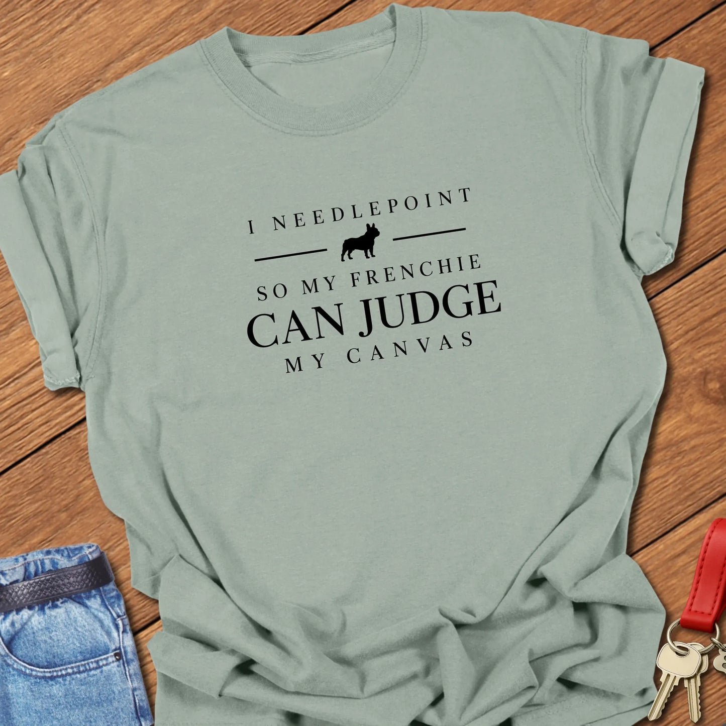 Judge My Needlepoint text design featuring a French Bulldog silhouette on a Comfort Colors 1717 cotton t shirt in Bay color.