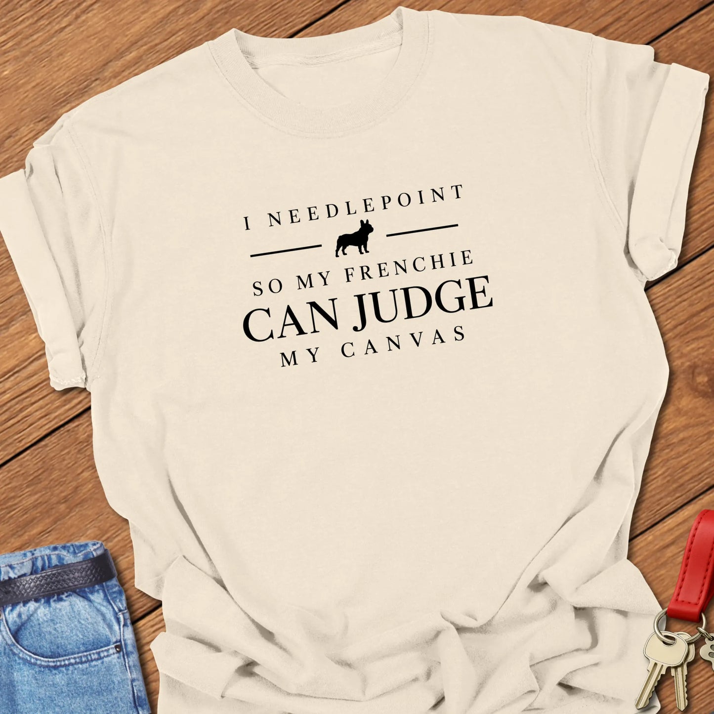 Judge My Needlepoint text design featuring a French Bulldog silhouette on a Comfort Colors 1717 cotton t shirt in Ivory color.