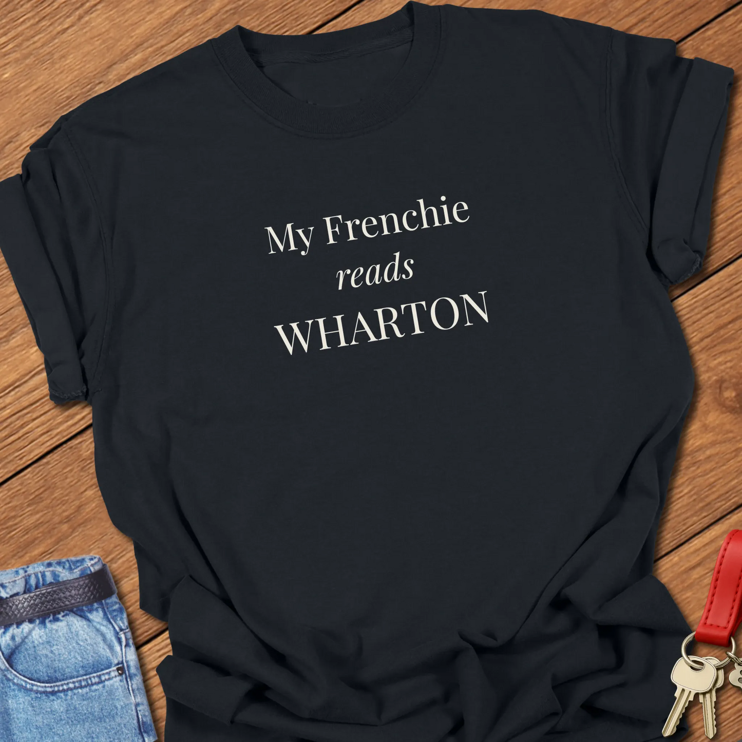 A Comfort Colors® garment-dyed shirt in Black with elegant serif typography featuring My Frenchies Reads Wharton."